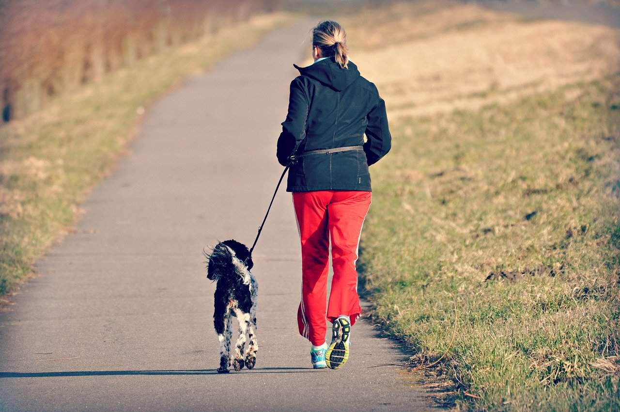 Woman Walking Her Dog